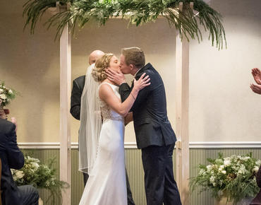 bride and groom indoor ceremony