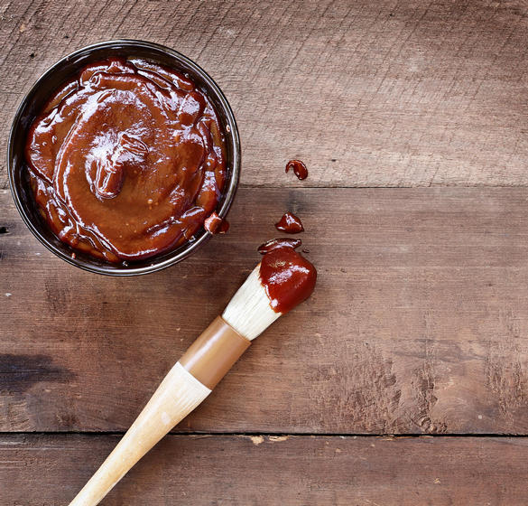 Barbecue sauce and basting brush